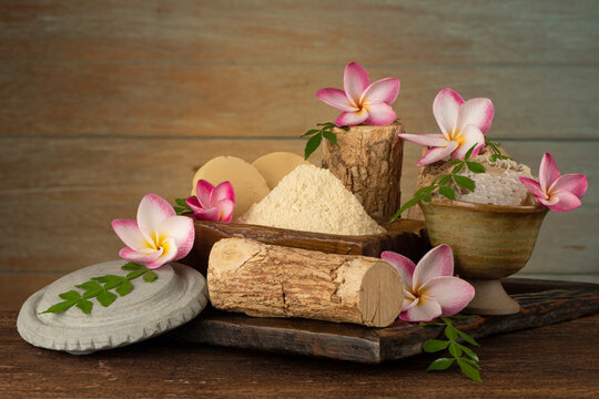 Still life with thanaka on an old wood background.