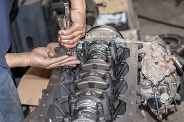 mechanic changing the wheel of car