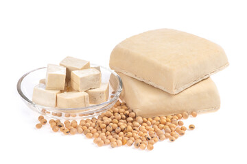 Tofu and soybeans isolated on white background.