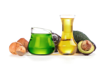 Avocado fruits and oil isolated on white background.