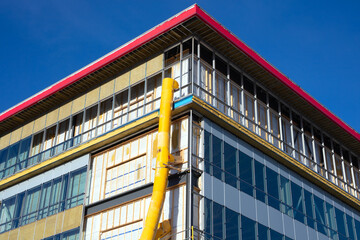 construction site building isolation glass facade working