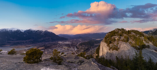 Fototapeta na wymiar Panoramic View of Beautiful Canadian Landscape and Squamish City. Colorful Dramatic Sunset Sky Art Render. Taken from Chief Mountain, near Vancouver, British Columbia, Canada.
