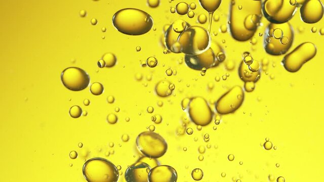 Super slow motion of flowing oil bubbles in water, 1000 fps. Filmed on high speed cinema camera, 1000fps.