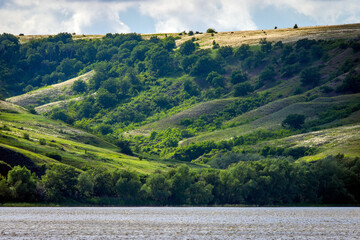 Obraz premium Panoramic view of the river Don and hills, slopes, steppe coast, gully, ravine on a banks