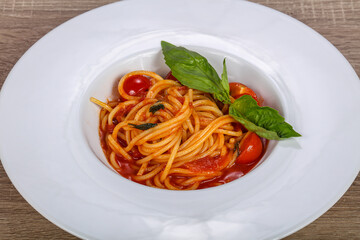 Vegetarian pasta with tomato and basil