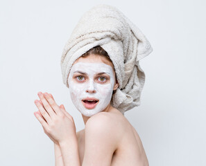 woman cream face mask bare shoulders clean skin