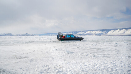 Hovercraft on Frozen Ice Surface. Baikal Lake in Winter