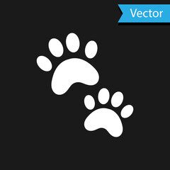 White Paw print icon isolated on black background. Dog or cat paw print. Animal track. Vector