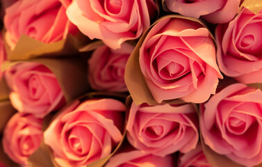 A large bouquet of multicolored roses in a soft and blurry style for the background