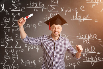 Blackboard with written maths formulas