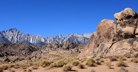 mount whitney, the eastern sierras, and the wildly-eroded alabama hills on a sunny fall day near lone pine, california