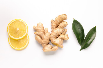 Fresh ginger and lemon on white background