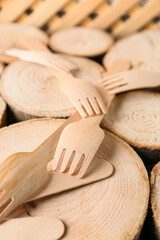 Wooden forks on table, closeup