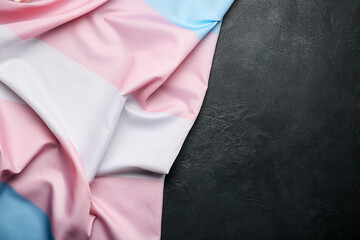 Transgender flag on dark background