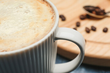 Cup of tasty latte, closeup