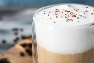 Glass of tasty latte, closeup