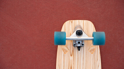 Surf skate board on red floor  background skating skateboard © Love the wind