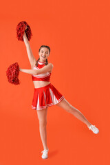 Beautiful cheerleader on color background