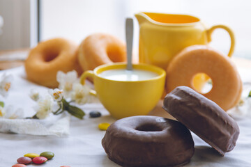 breakfast or snack with donuts and cup of milk