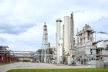 Large-capacity ammonia production workshop. Exterior of modern petrochemical plant with reactors...