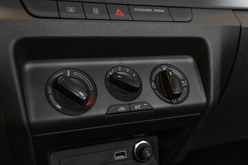 interior view of a modern new car. Climatronic or air conditioner system button.German Car.
