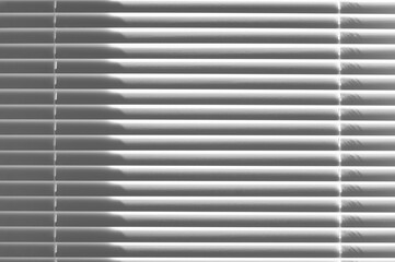 Sunlight through metallic shutters