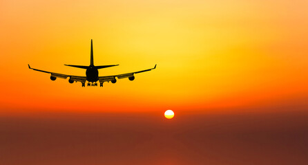 Airplane take off on a sunset.
