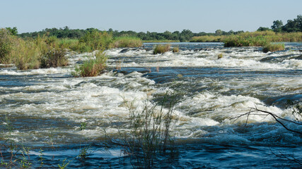 River in full flow with rapids