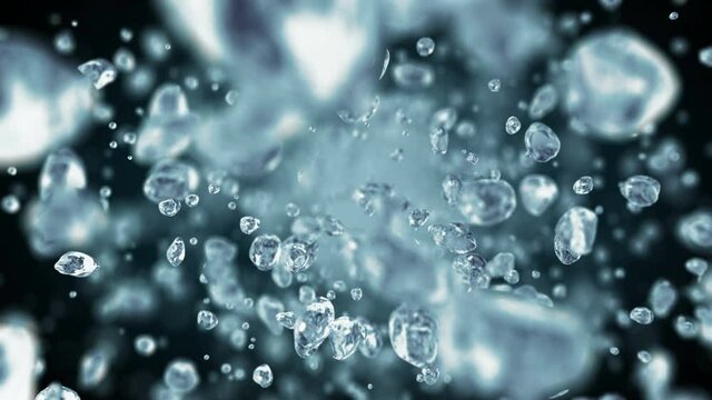 Water drops flying in super slow motion 4K