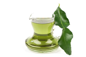 Citrus hystrix or kaffir lime green leaf and oil isolated on white background.