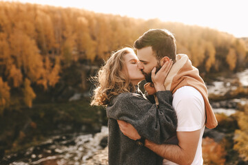 Happy in love romantic young cheerful couple man and woman married travel hiking walk together...