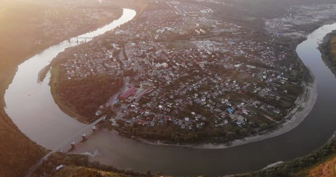 Beautiful panoramic view from the drone to the river around the town