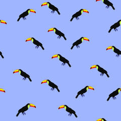 Tropical pattern. Pattern of tropical birds toucans. Exotic seamless background.