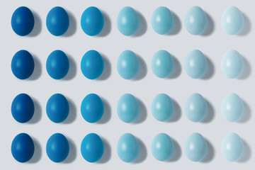 Easter pattern with eggs painted in blue gradient color design on a bright white background. Minimal Happy Easter celebration, texture or greeting card. Flat lay, top view.