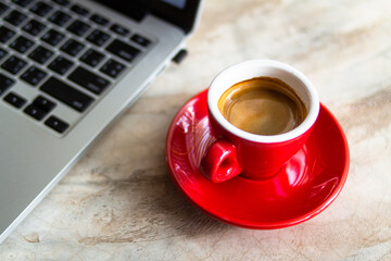 top view of red cup with fresh coffee on saucer on white background, panoramic shot