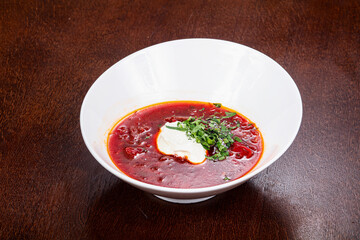 Russian traditional borsch soup with sour cream