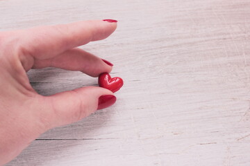 hand holding a heart