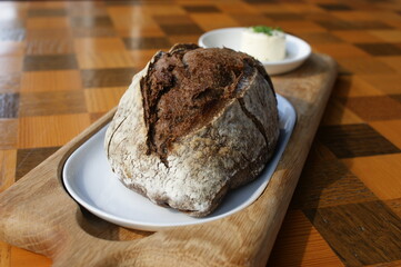 black bread on a table. fresh black bread in a restaurant. brown tommy