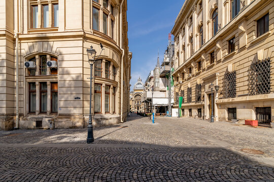 The intersection of Stavropoleos and Poștei streets in the Lipscani district in the historic center of Bucharest, Romania on a sunny day