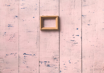 frame on old pink wall