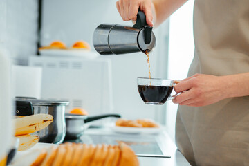 Making coffee to wake up in the morning