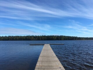 Wooden pier on the lake in Northern Sweden