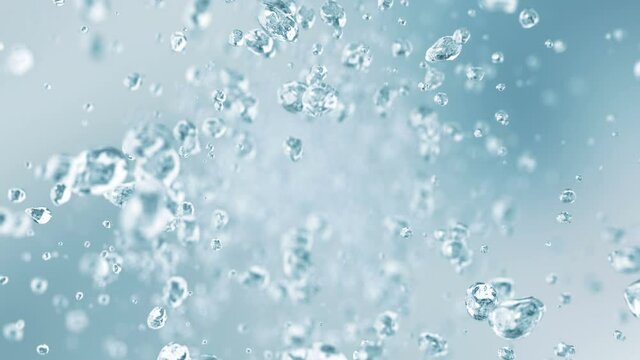 Water drops flying in super slow motion 4K