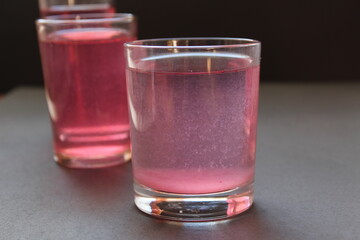 Compote juice mors milk nail pink on a black gray background with space for text and copyspace © Кристина Шоба