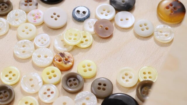 Round colored buttons in box