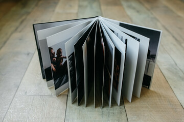 example of a family photo book, high-quality photo print, spread of the book, store memories beautifully in a family album