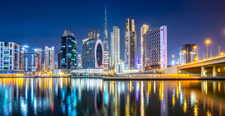 Panorama of night Dubai city skyline, UAE