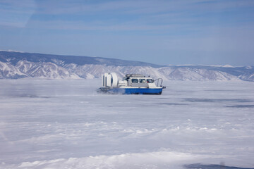 Khivus boat hovercraft tourist entertainment at Baikal lake floats next to Listvyanka.