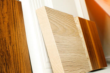 Sample of wood chipboard for display in a furniture showroom. Wooden laminate veneer material for interior architecture.