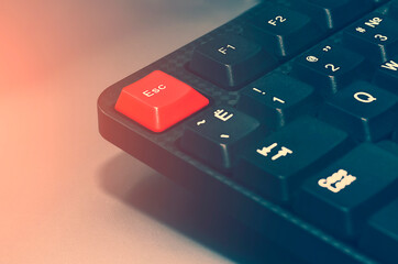 Red button with the inscription esk on a computer keyboard.